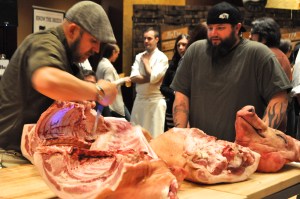 Jason Nauert breaking down a whole hog. Photo by Sandra Morriss.